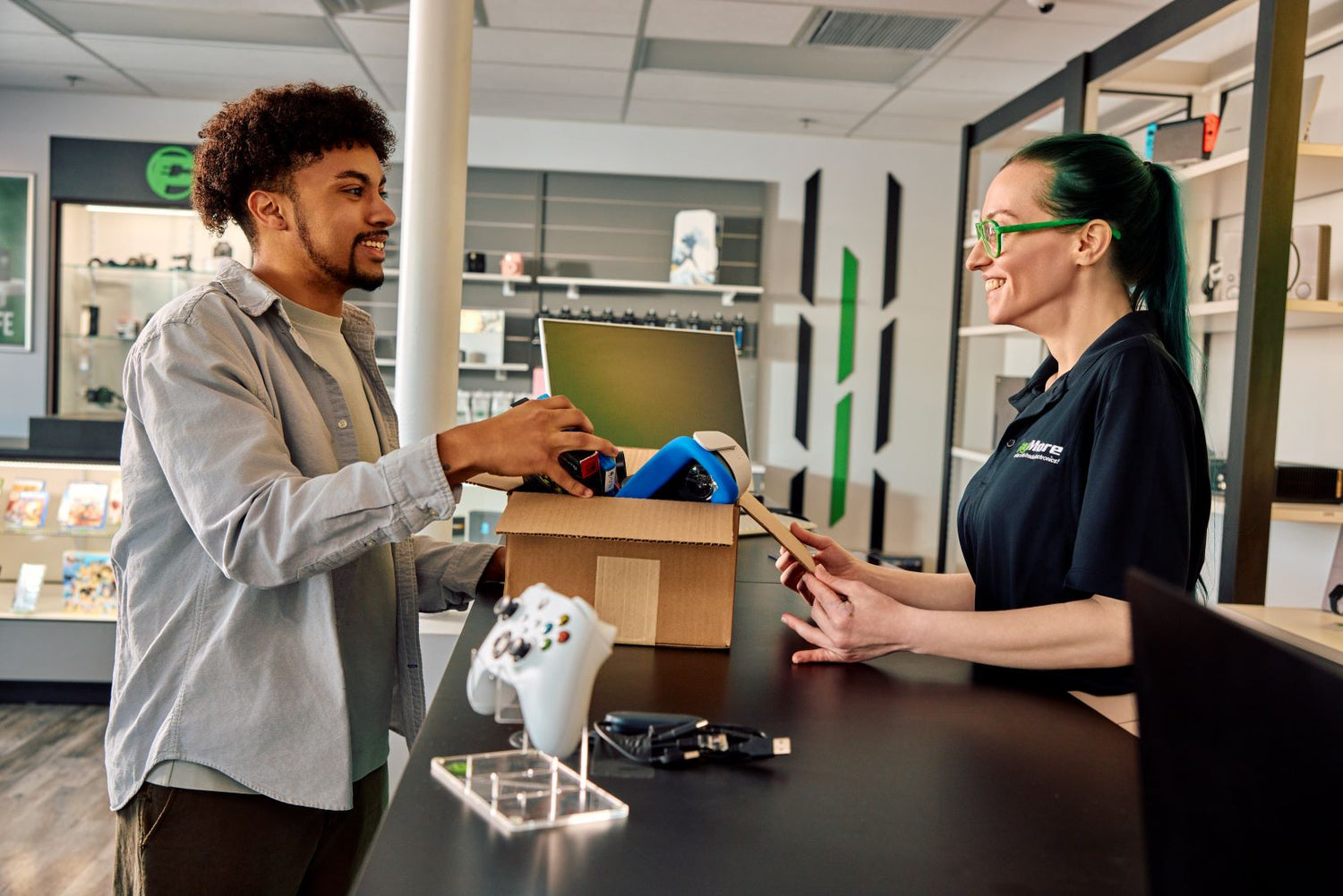 employee inspecting electronics