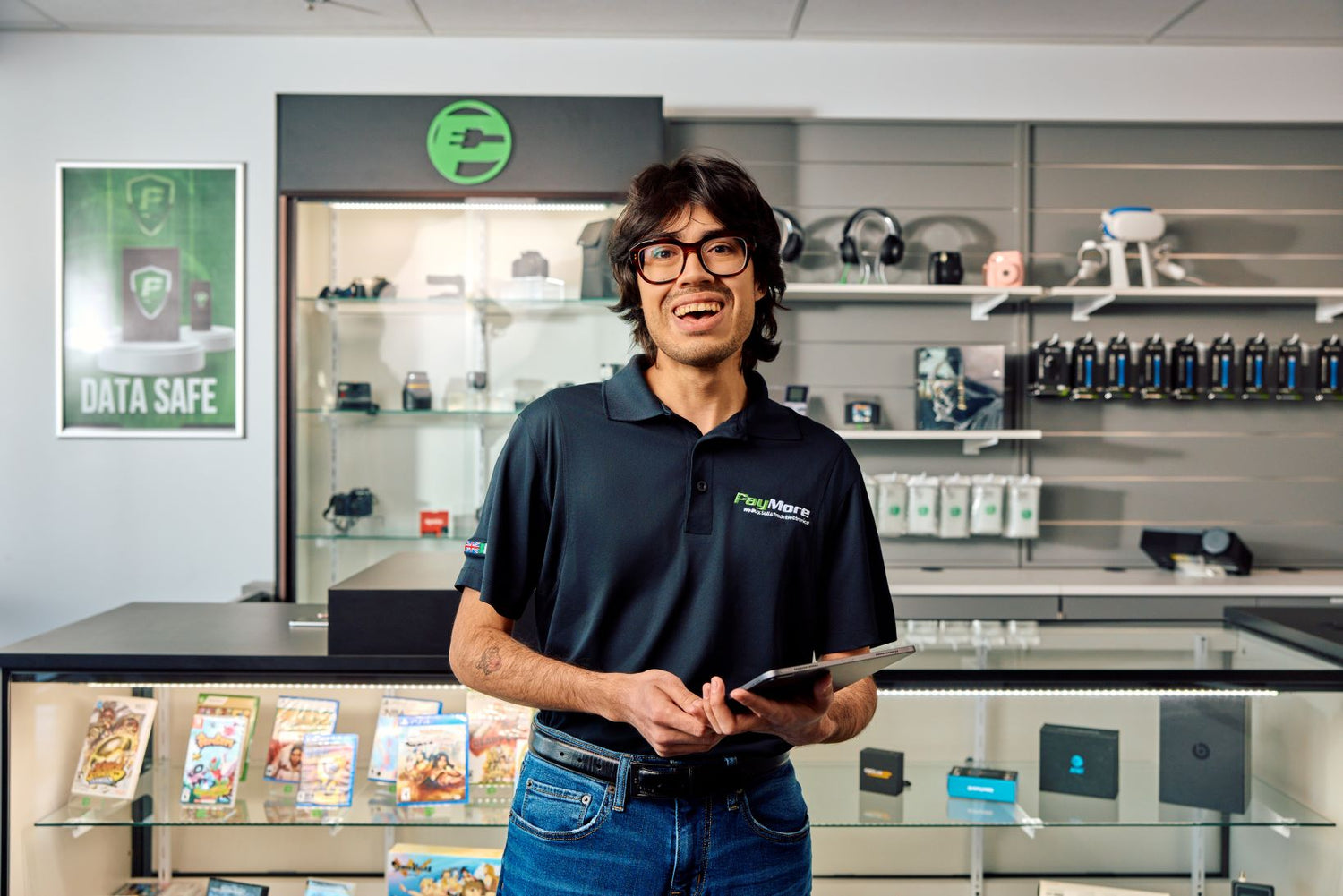 employee holding a tablet and smiling